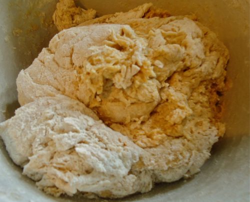 mixing in more flour