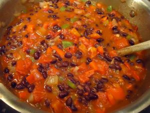 Add the broth and stir gently. 