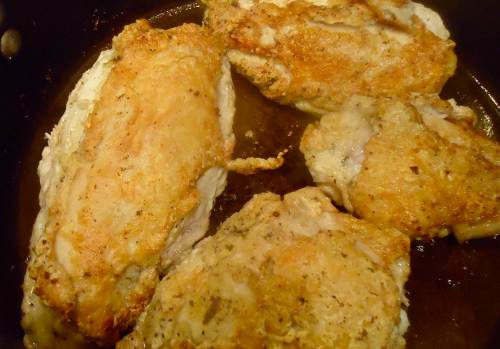 Brown the dredged chicken in the pork belly drippings. It took two batches for me as I have a very large Dutch oven. 