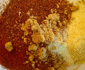 Mix teh seasonings (like salt) , the spices and the teaspoon of sugar in a bowl. Add this to cooked veggies.