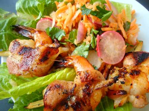 Here is this slaw served with grilled sugar cane shrimp (wrapped in bacon).