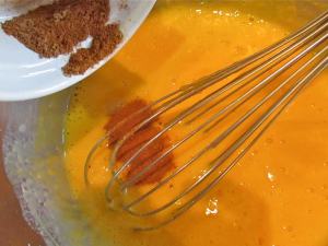 In a heavy bottomed pot or double boiler you will cook the egg yolks, half & half and the pureed squash. Stir in spices...