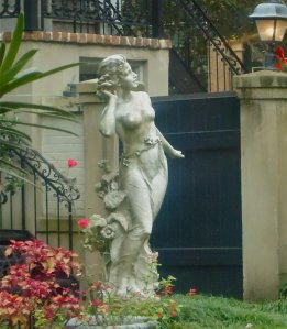There's a pretty lady in this side garden, 'peek" gardens are similar to those found in Charleston, SC.