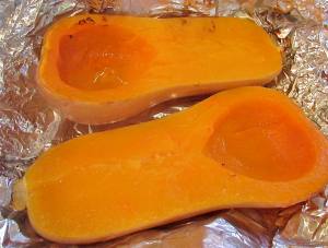 After roasting the squash, open the foil and allow to cool enough to handle. 