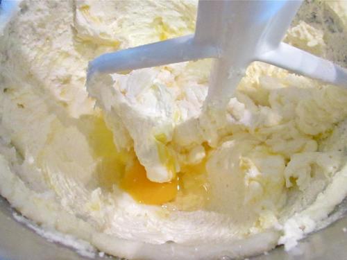 In the mixer cream the butter and sugar, then add the eggs one at a time. Once that is done you will add the extracts and then alternately add the flour mixture and the puree/milk mixture.
