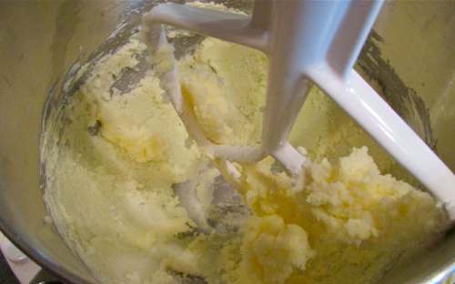 Mix the butter and sugar until well combined )no need to 'cream' them, however). Add the eggs and extracts to this mixture.