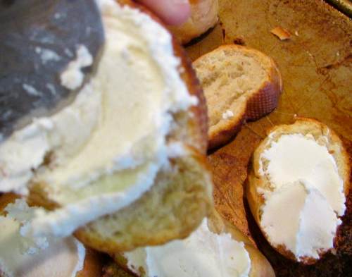 Put the toasts together - slather a good layer of the goat cheese on toasted French bread slices, top with the warm mushroom mixture and sprinkle with parsley.