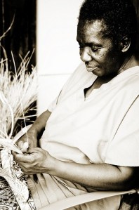 Gullah artisan creating a one-of-a-kind sweetgrass basket. 