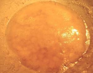 What you are left with is clarified butter. It has much high smoke point that regular butter so it browns and crisps food nicely without as much chance of burning.