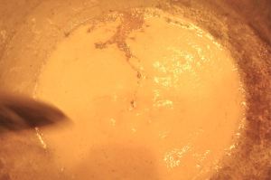 To clarify the butter, melt it in a heavy saucepan. You will see foam rise to the top.