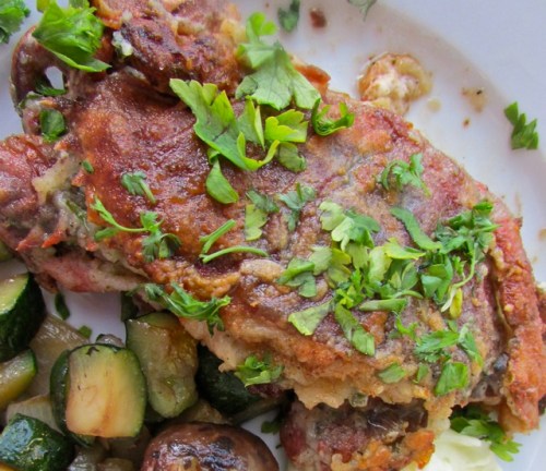 Another shot of this beautiful entree. I served the crab with garlic smashed potatoes and a saute of Vidalia onion, zucchini and baby portobello mushrooms. 